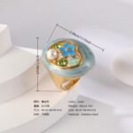 24K Gold PVD Stainless Steel Titanium Flower & Pearl Women's Ring - Image 3
