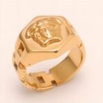 Trendy Men's Gold - colored Stainless Steel Ring with Embossed Medusa Motif | G00207JT - Image 3