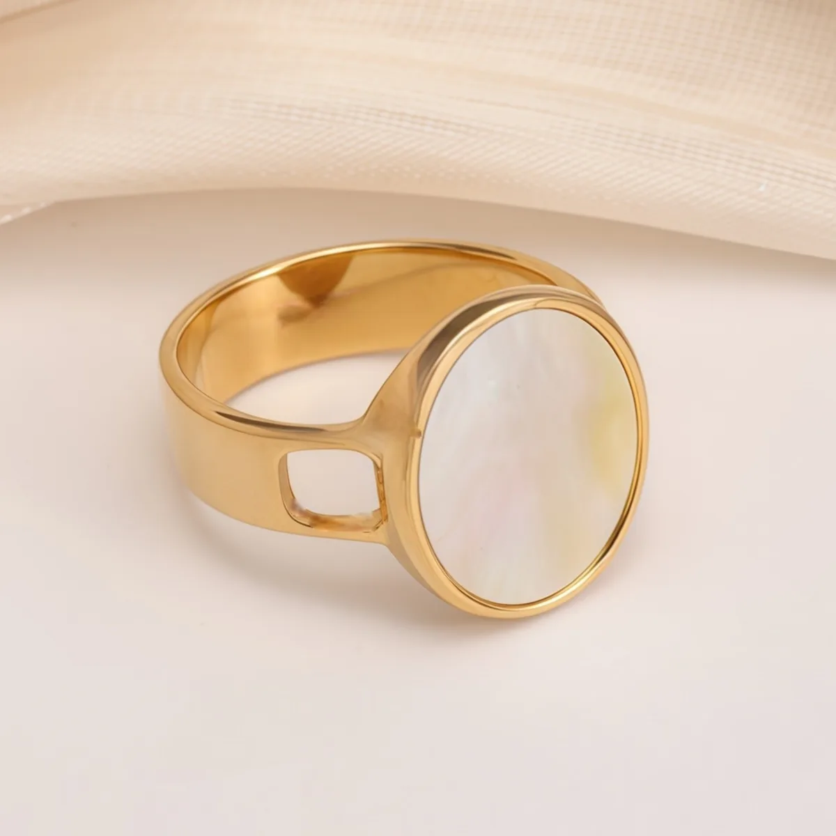 fashionable gold mother of pearl ring eye catching accessory for stylish outfits