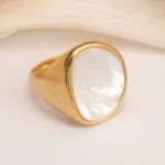 fashionable gold mother of pearl ring eye catching accessory for stylish outfits