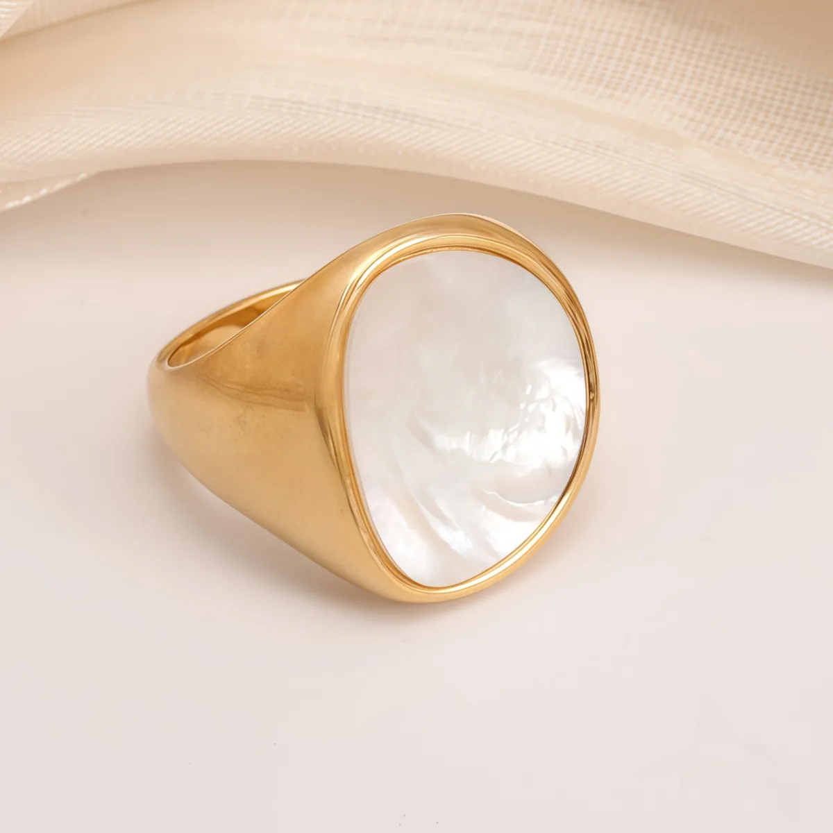 fashionable gold mother of pearl ring eye catching accessory for stylish outfits