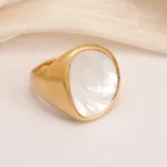 fashionable gold mother of pearl ring eye catching accessory for stylish outfits
