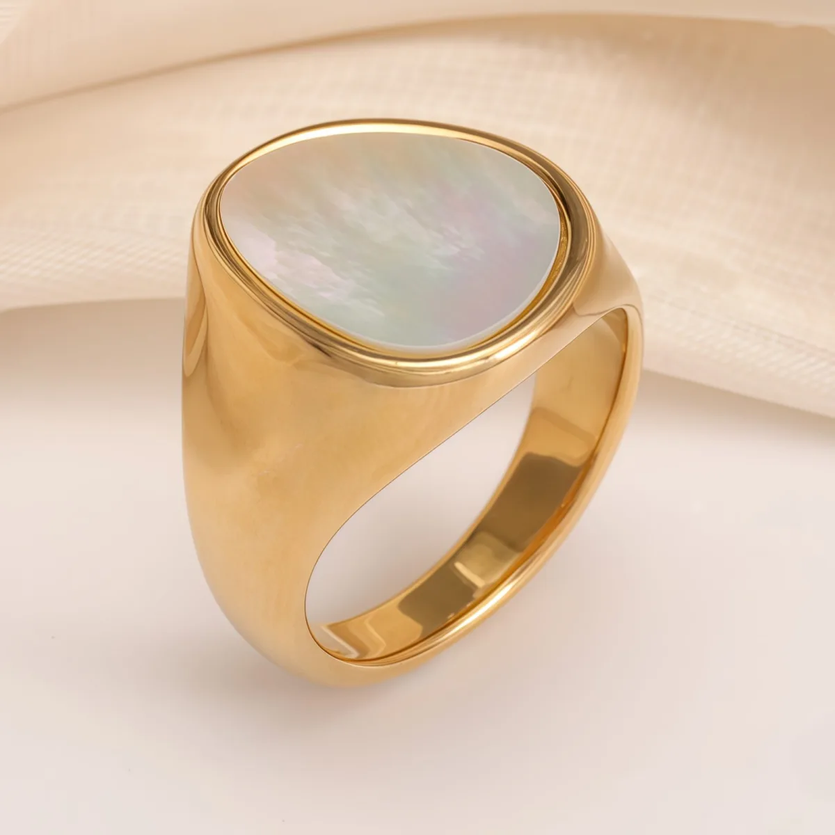 fashionable gold mother of pearl ring eye catching accessory for stylish outfits