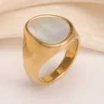 fashionable gold mother of pearl ring eye catching accessory for stylish outfits