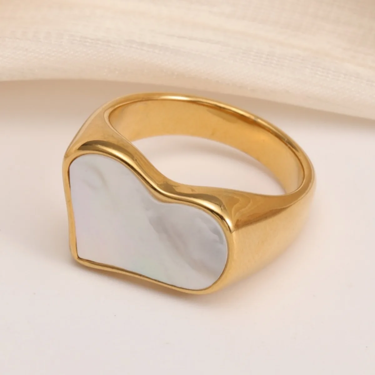 fashionable gold mother of pearl ring eye catching accessory for stylish outfits
